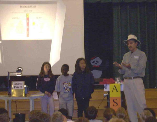 Max convinces students they must "leap over" the Math Wall to succeed.